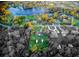 House near a lake with a large backyard at 1159 Collins Ave, Orange City, FL 32763