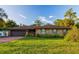 Ranch-style brick home with attached garage at 1159 Collins Ave, Orange City, FL 32763