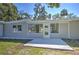 Updated house exterior with a large backyard at 106 Orange Dr, Sanford, FL 32773
