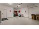 Spacious garage with storage and epoxy flooring at 2071 Limestone Trl, Kissimmee, FL 34747