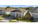 Aerial view of house and surrounding neighborhood at 2071 Limestone Trl, Kissimmee, FL 34747