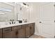Elegant bathroom with double vanity and modern fixtures at 2071 Limestone Trl, Kissimmee, FL 34747
