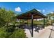 Community gazebo with benches for relaxing at 2071 Limestone Trl, Kissimmee, FL 34747