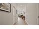 Hallway with hardwood floors, leading to living room at 2071 Limestone Trl, Kissimmee, FL 34747