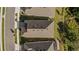 Aerial view of a house from above showing the roof and yard at 2071 Limestone Trl, Kissimmee, FL 34747