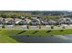 Aerial view of neighborhood with lakefront properties at 2071 Limestone Trl, Kissimmee, FL 34747