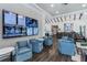 Relaxing clubhouse lounge with large screen TVs and comfortable seating at 2071 Limestone Trl, Kissimmee, FL 34747