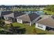 Aerial view of house and backyard with pond view at 2071 Limestone Trl, Kissimmee, FL 34747