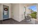 Covered porch with rocking chairs and a welcoming atmosphere at 2071 Limestone Trl, Kissimmee, FL 34747