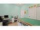 Bright and spacious craft room with large work table and sewing machine at 2071 Limestone Trl, Kissimmee, FL 34747