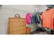 Well-organized closet featuring hanging rods and shelving at 2071 Limestone Trl, Kissimmee, FL 34747