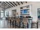 Community clubhouse bar with stylish tile and comfortable seating at 2071 Limestone Trl, Kissimmee, FL 34747