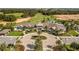 Community center with palm trees and a circular driveway at 2071 Limestone Trl, Kissimmee, FL 34747
