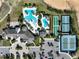 Aerial view of community amenities including pools, tennis, and bocce ball courts at 2071 Limestone Trl, Kissimmee, FL 34747