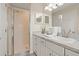Clean bathroom with a shower, vanity, and updated fixtures at 1055 Lake Berkley Dr, Kissimmee, FL 34746