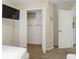 Spacious bedroom with walk-in closet and adjacent bathroom access at 1055 Lake Berkley Dr, Kissimmee, FL 34746