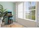 Game room with an arcade game and a large window at 1055 Lake Berkley Dr, Kissimmee, FL 34746
