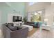 Spacious living room with comfy sofas and large TV at 1055 Lake Berkley Dr, Kissimmee, FL 34746