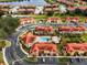 Community pool and surrounding buildings at 1055 Lake Berkley Dr, Kissimmee, FL 34746