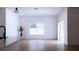 Spacious living room with light flooring and large windows at 13882 Sw 56Th Ln, Ocala, FL 34482