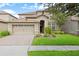 Beautiful two-story home with a three-car garage at 1473 Moon Valley Dr, Davenport, FL 33896