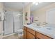 Clean bathroom with a large shower and vanity with modern fixtures at 1473 Moon Valley Dr, Davenport, FL 33896
