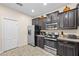 Modern kitchen with stainless steel appliances at 1473 Moon Valley Dr, Davenport, FL 33896