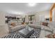 Open concept living room and kitchen area at 1473 Moon Valley Dr, Davenport, FL 33896