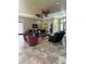 Clubhouse common area with seating, tables, and large windows at 413 Summit Ridge Pl # 209, Longwood, FL 32779