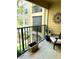 Private balcony with seating area, offering a peaceful outdoor space at 413 Summit Ridge Pl # 209, Longwood, FL 32779