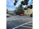 Parking lot with available parking spaces for residents at 413 Summit Ridge Pl # 209, Longwood, FL 32779