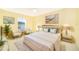 Spacious bedroom with a plush bed, ample light, and stylish decor at 514 Margaret Ln, Lake Wales, FL 33853