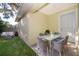 Cozy patio with seating area, perfect for outdoor dining at 514 Margaret Ln, Lake Wales, FL 33853