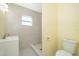 Updated bathroom with a shower, toilet, and vanity at 514 Margaret Ln, Lake Wales, FL 33853