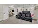 Home theater with reclining seats and large projection screen at 4001 Ainsley Ave, Orlando, FL 32833