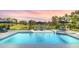 Inviting pool area with spa and expansive backyard views at 4001 Ainsley Ave, Orlando, FL 32833