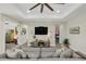 Bright Gathering room with built-in entertainment center and comfortable seating at 4001 Ainsley Ave, Orlando, FL 32833