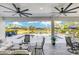 Spacious covered patio with comfortable seating and pool views at 4001 Ainsley Ave, Orlando, FL 32833