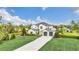 Two-story house with a large yard and two-car garage at 4001 Ainsley Ave, Orlando, FL 32833