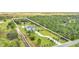 Aerial view of the property, showing the house and surrounding land at 4001 Ainsley Ave, Orlando, FL 32833