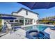 Stunning pool and spa with spacious patio and umbrellas at 4001 Ainsley Ave, Orlando, FL 32833