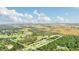 Aerial view of a house on a large lot with surrounding properties at 4001 Ainsley Ave, Orlando, FL 32833