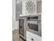 Kitchen features built-in microwave and wine cooler at 4001 Ainsley Ave, Orlando, FL 32833