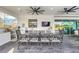 Outdoor kitchen with dining area and built-in grill at 4001 Ainsley Ave, Orlando, FL 32833