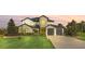 Stunning two-story home with stone and wood accents at 4001 Ainsley Ave, Orlando, FL 32833