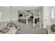 Open loft overlooking the living room with a chandelier and seating area at 4001 Ainsley Ave, Orlando, FL 32833