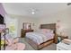 Spacious bedroom with a stylish bed and ample closet space at 4001 Ainsley Ave, Orlando, FL 32833