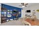 Room with dual monitor setup, printer, and additional table at 4001 Ainsley Ave, Orlando, FL 32833