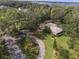 Stunning waterfront property with lush landscaping at 33629 Wesley Rd, Eustis, FL 32736