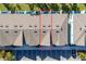 Top-down view of townhome building, showing roofline and parking at 7960 Formosa Valley Pl, Kissimmee, FL 34747